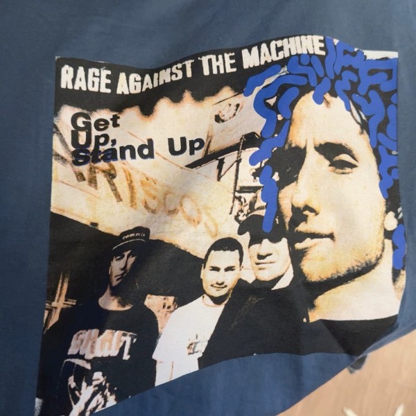 rage against the machine tee with a giant tee Jays tag