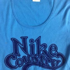 Vintage 80s Women's "Nike Country" Graphic Blue T-Shirt